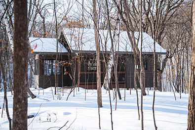 Embrace Prayer Cabin exterior in the woods